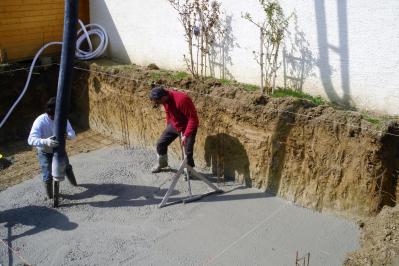 Guide construction piscine Auterive coulage béton